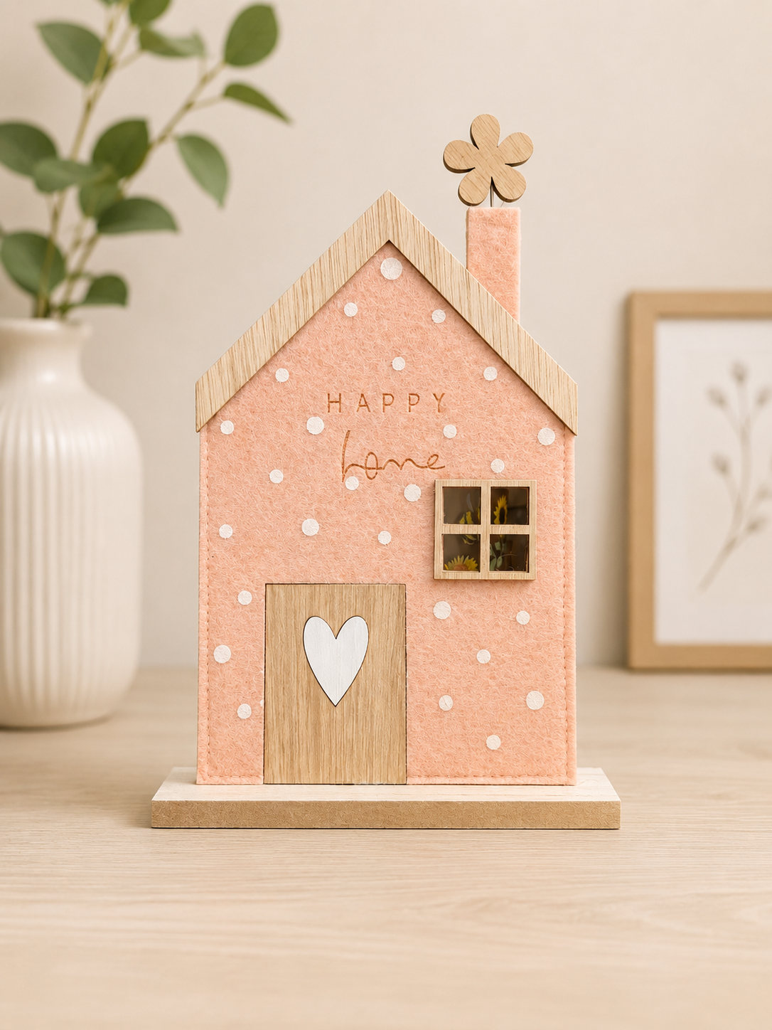 Single pink felt home on stand