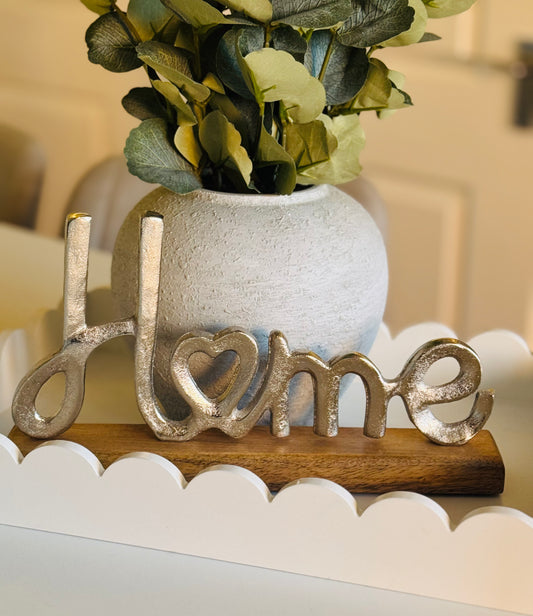 'Home' metal sign