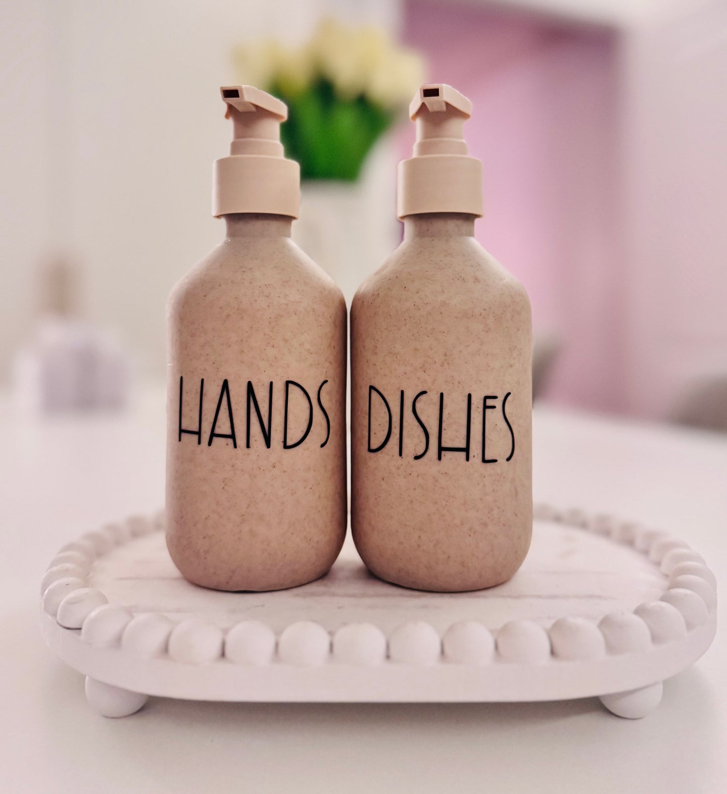 Beige Soap Dispensers.