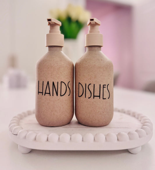 Beige Soap Dispensers.