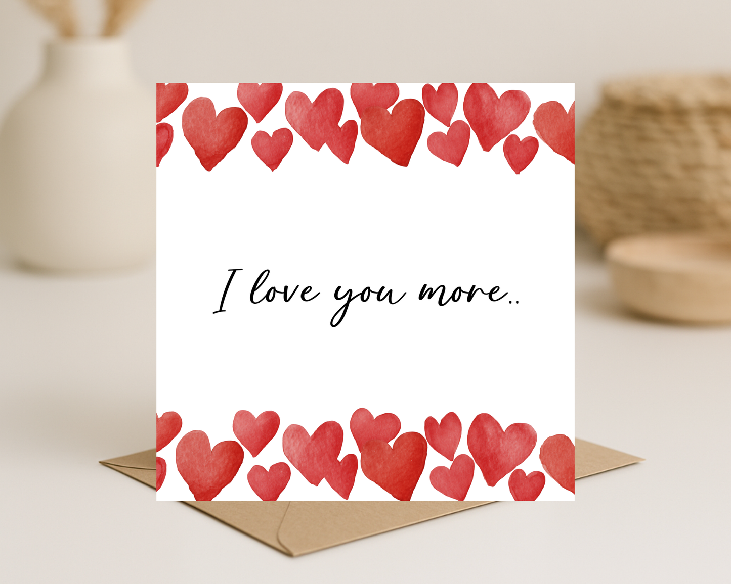 Love you more card.
